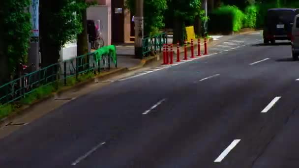 Sebuah tiLapse jalan mobil di jalan Kanpachi di Tokyo siang hari tembakan lebar — Stok Video