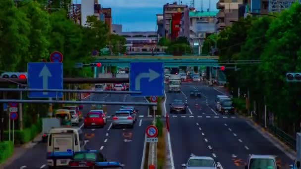เวลาของถนนรถยนต์ที่ถนน Kanpachi ในโตเกียวตอนกลางวันถ่ายภาพกว้าง — วีดีโอสต็อก