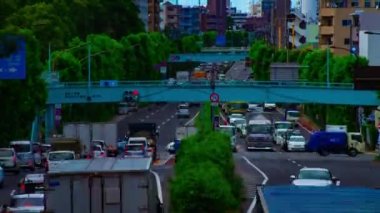 Tokyo 'da Kanpachi Bulvarı' ndaki otomobil sokağının zaman çizelgesi.