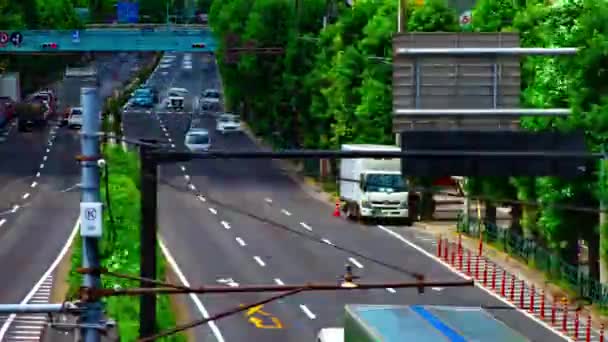 A Kanpachi sugárút autós utcájának időzónája Tokióban, napközben. — Stock videók