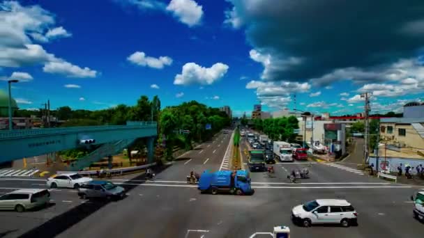 Sebuah tiLapse jalan mobil di jalan Kanpachi di Tokyo siang hari tembakan lebar — Stok Video