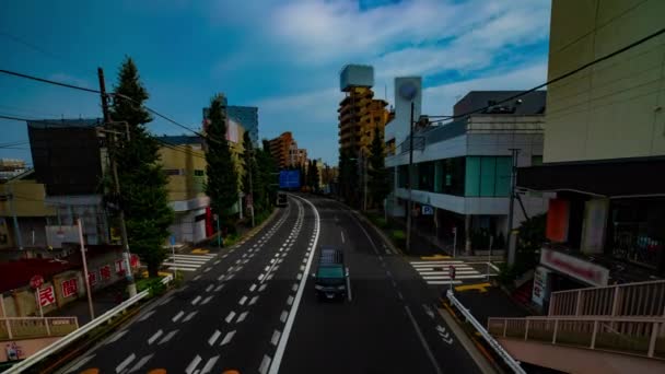 Timelapse ulicy w centrum w Oume Avenue w Tokio w ciągu dnia szeroki strzał — Wideo stockowe