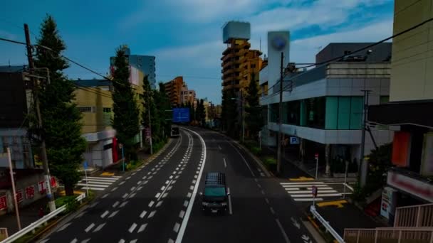 Timelapse ulicy w centrum w Oume Avenue w Tokio w ciągu dnia szeroki strzał — Wideo stockowe