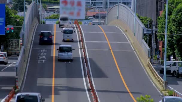 A downtown street at Kanpachi avenue in Tokyo daytime long shot — Stock Video