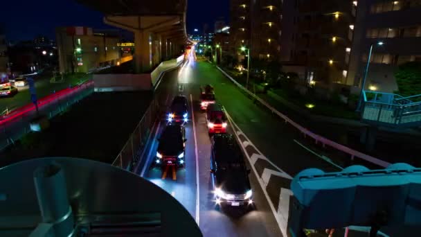 Uma cronologia noturna da rua da cidade no centro da cidade em Setagaya Tokyo tiro largo — Vídeo de Stock