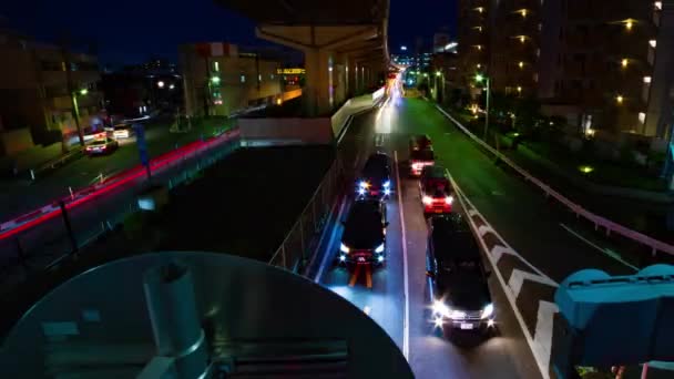 Uma cronologia noturna da rua da cidade no centro da cidade em Setagaya Tokyo tiro largo — Vídeo de Stock