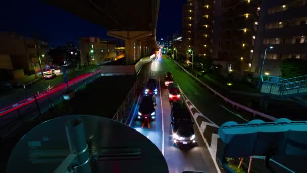 Ночной хронометраж городской улицы в центре Сэтагая Токио. — стоковое видео