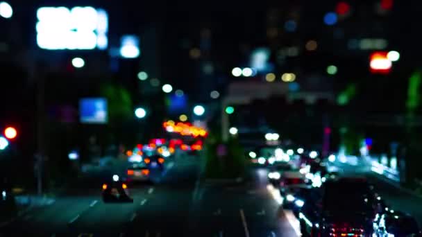 Un timelapse noche de la calle de la ciudad en el centro de Setagaya Tokio tilt-shit — Vídeo de stock