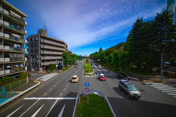 A downtown street at Kanpachi avenue in Tokyo daytime wide shot — Stock Photo, Image