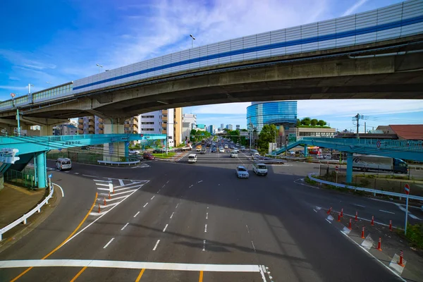 A downtown street at Kanpachi avenue in Tokyo daytime wide shot — Stock Photo, Image