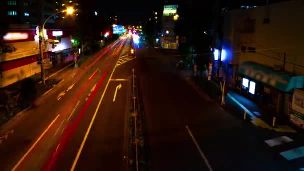 Un timelapse noche de la calle de la ciudad en el centro de Suginami Tokio tiro de par en par — Vídeos de Stock