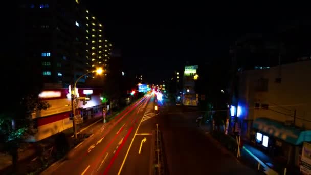 Een nacht timelapse van de stad straat in het centrum in Suginami Tokyo Wide shot — Stockvideo