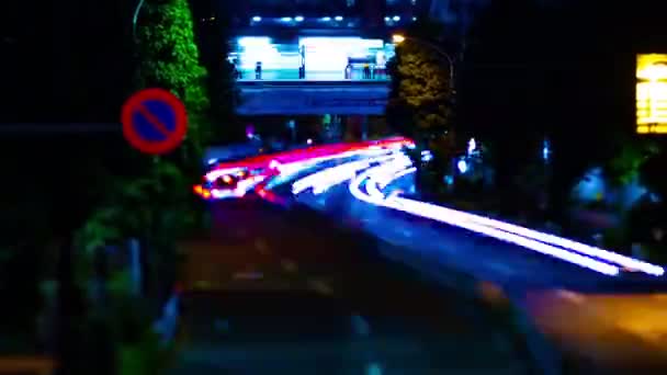 Uma cronologia noturna da rua da cidade no centro da cidade em Suginami Tokyo tiltshift — Vídeo de Stock