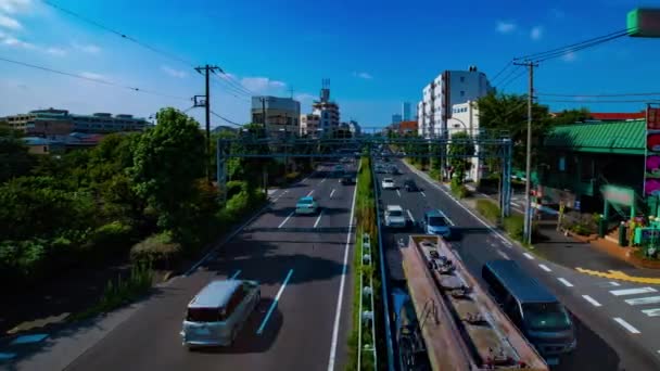 Een timelapse van Downtown Street op Kanpachi Avenue in Tokio overdag breed schot — Stockvideo