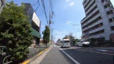 Tokyo gündüz Oume caddesinde şehir caddesi bir sürüş timelapse