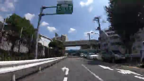 En drivande Timelapse av Downtown Street på Oume Avenue i Tokyo dagtid — Stockvideo