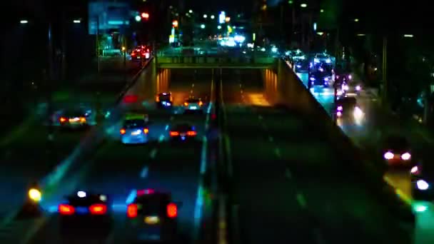 A night timelapse of the city street at the downtown in Setagaya Tokyo tiltshift — ストック動画