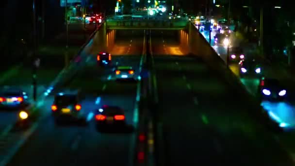 Uma cronologia noturna da rua da cidade no centro da cidade em Setagaya Tokyo tiltshift — Vídeo de Stock