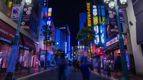 Un timelapse noche de la ciudad de neón en Setagaya Tokio amplia — Vídeos de Stock