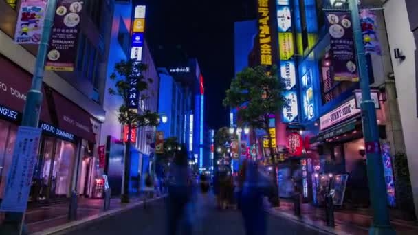 Un timelapse noche de la ciudad de neón en Setagaya Tokio amplia — Vídeo de stock