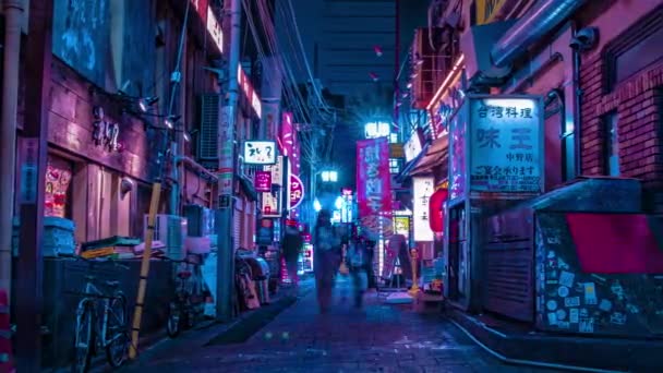 Nakano Tokió belvárosában, a neon utca éjszakai időzónájában. — Stock videók