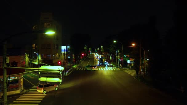 Uma cronologia noturna da rua da cidade no centro da cidade em Suginami Tóquio — Vídeo de Stock