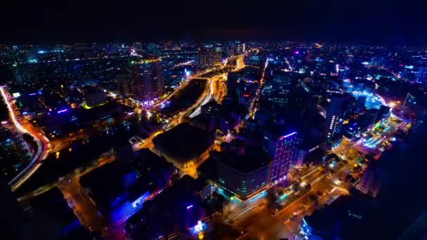 Un lapso de tiempo nocturno de paisaje urbano en Ho Chi Minh plano de gran angular — Vídeo de stock