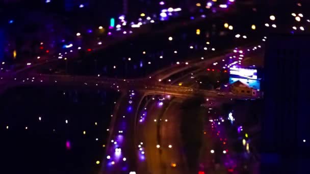 Un timelapse notte di ingorgo traffico in miniatura in Vietnam Ho Chi Minh alto angolo tiltshift — Video Stock