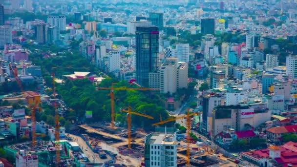 A timelapse of cranes at the under construction in Ho Chi Minh high angle panning — Stock Video