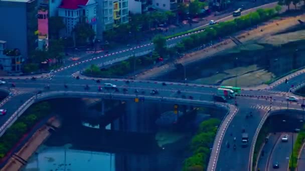 Ένα timelapse της κυκλοφορίας μαρμελάδα στην πολυσύχναστη πόλη στο Ho Chi Minh υψηλή γωνία μακρινή βολή zoom — Αρχείο Βίντεο