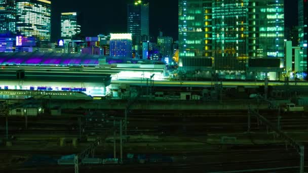 Timelapse miejskiego krajobrazu na miejskim mieście przed Tokio stacją panning — Wideo stockowe