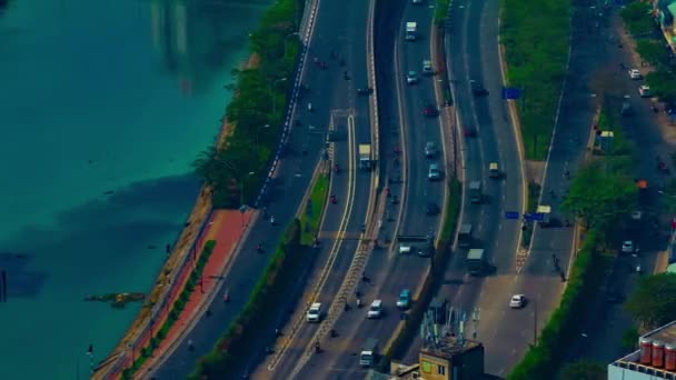 A timelapse do engarrafamento na cidade movimentada em Ho Chi Minh ângulo alto tiro longo panning — Vídeo de Stock