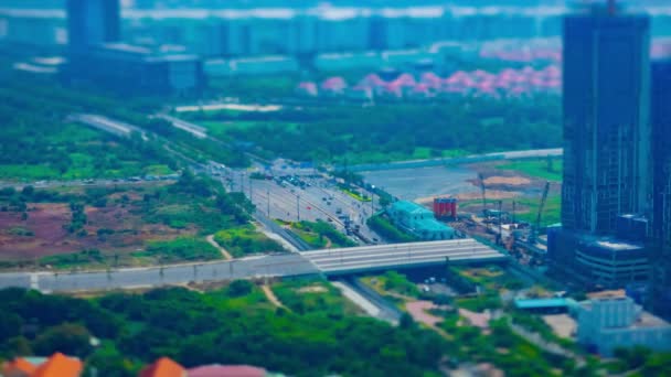 Een tijdspanne van miniature files op de drukke stad in Ho Chi Minh hoge hoek panning — Stockvideo
