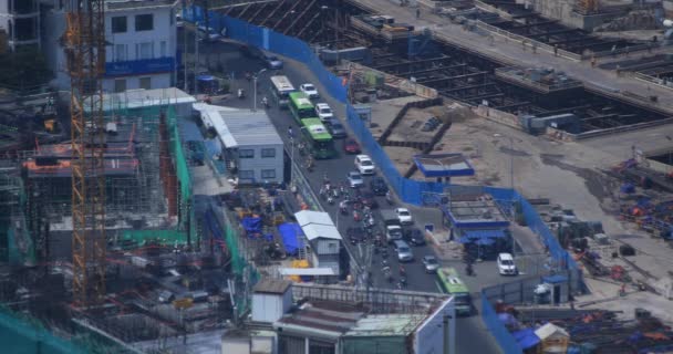 Un embouteillage près de la en construction à Ho Chi Minh angle élevé long shot — Video