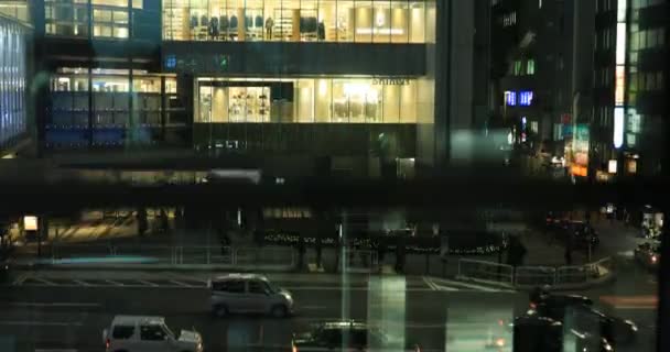Een avond stad landschap van rijzende lift op de stedelijke stad in Tokio hoge hoek — Stockvideo
