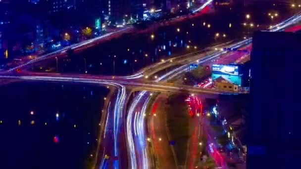 En natt timelapse av trafikstockning i Ho Chi Minh Vietnam hög vinkel långskott zoom — Stockvideo