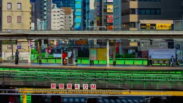 Timelapse korka na Iidabashi stacji w Tokio dziennym długim strzale zoom — Wideo stockowe