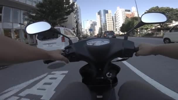 A point of view of driving by bike at Aoyama avenue in Tokyo — Stock Video