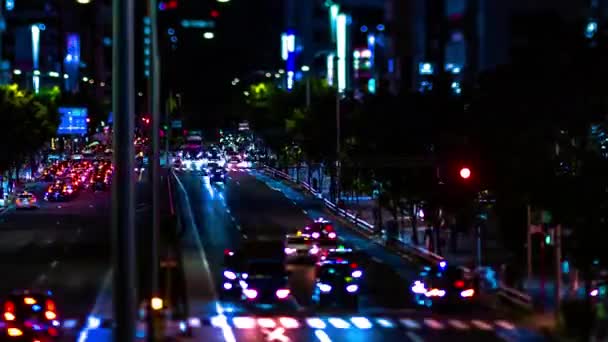 Een avond timelapse van de miniature stedelijke stad straat in Aoyama tiltshift zoom — Stockvideo