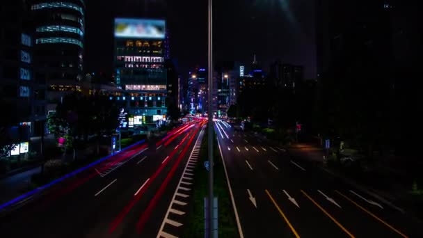 青山市区街道的一个夜晚过去了，宽镜头变焦了 — 图库视频影像