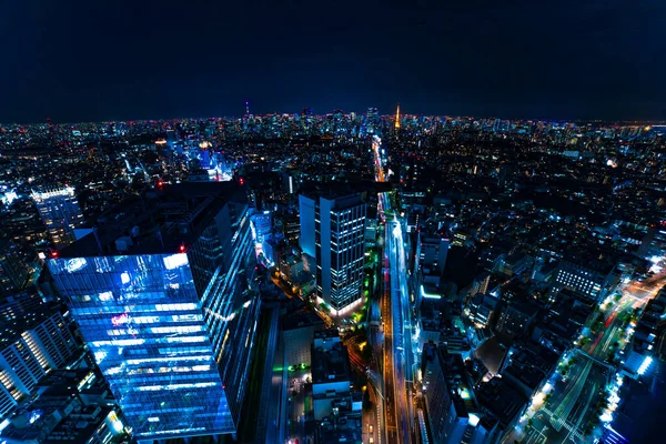 Uma paisagem urbana noturna na cidade urbana de Tóquio grande ângulo de tiro — Fotografia de Stock