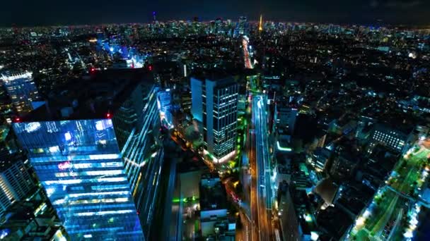 Nocny timelapse miejskiego krajobrazu na miejskim mieście w Tokio szeroki strzał wysoki kąt zoom — Wideo stockowe