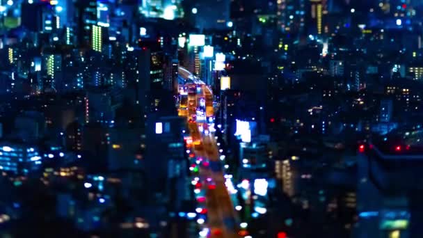 Een avond timelapse van miniature rijweg bij de stedelijke stad in Tokio tiltshift kantelen — Stockvideo