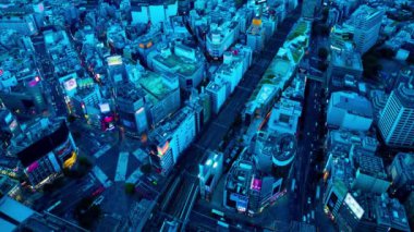 Shibuya bölgesindeki panoramik şehir manzarasının alacakaranlık zaman çizelgesi geniş açı geniş açı.