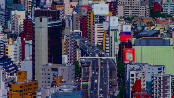 Uma cronologia do engarrafamento na rodovia na cidade urbana de Tóquio zoom de tiro longo — Vídeo de Stock