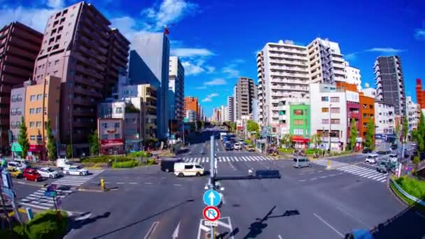 Un timelapse de la calle de tráfico en el centro de Tokio zoom ojo de pez — Vídeos de Stock