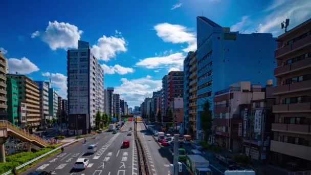 Az időeltolódás a közlekedési utcán a belvárosban Tokióban széles lövés panning — Stock videók