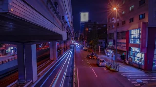 Een avond timelapse van de stad straat in Tokio wijd shot zoom — Stockvideo