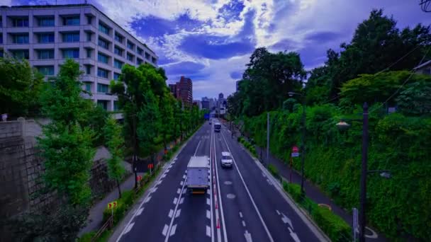 Uma cronologia da paisagem urbana na rua urbana em Tóquio durante o dia inclinação de tiro largo — Vídeo de Stock