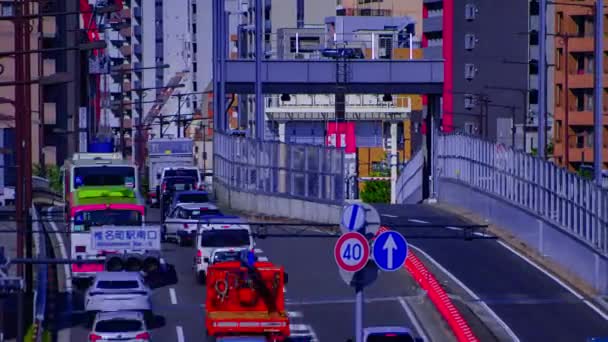 Een tijdspanne van stedelijk stadsgezicht op Yamanote avenue in Tokio lange gok panning — Stockvideo